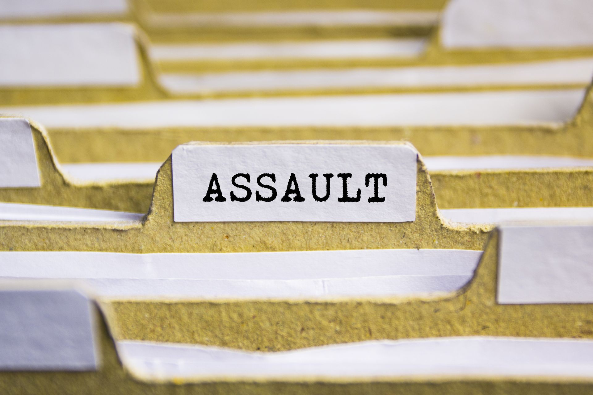 ASSAULT word on card index paper
